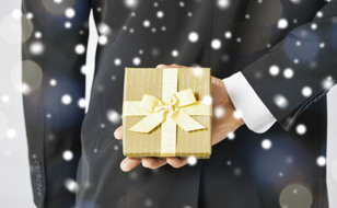 Man Holding Jewellery As A Christmas Present